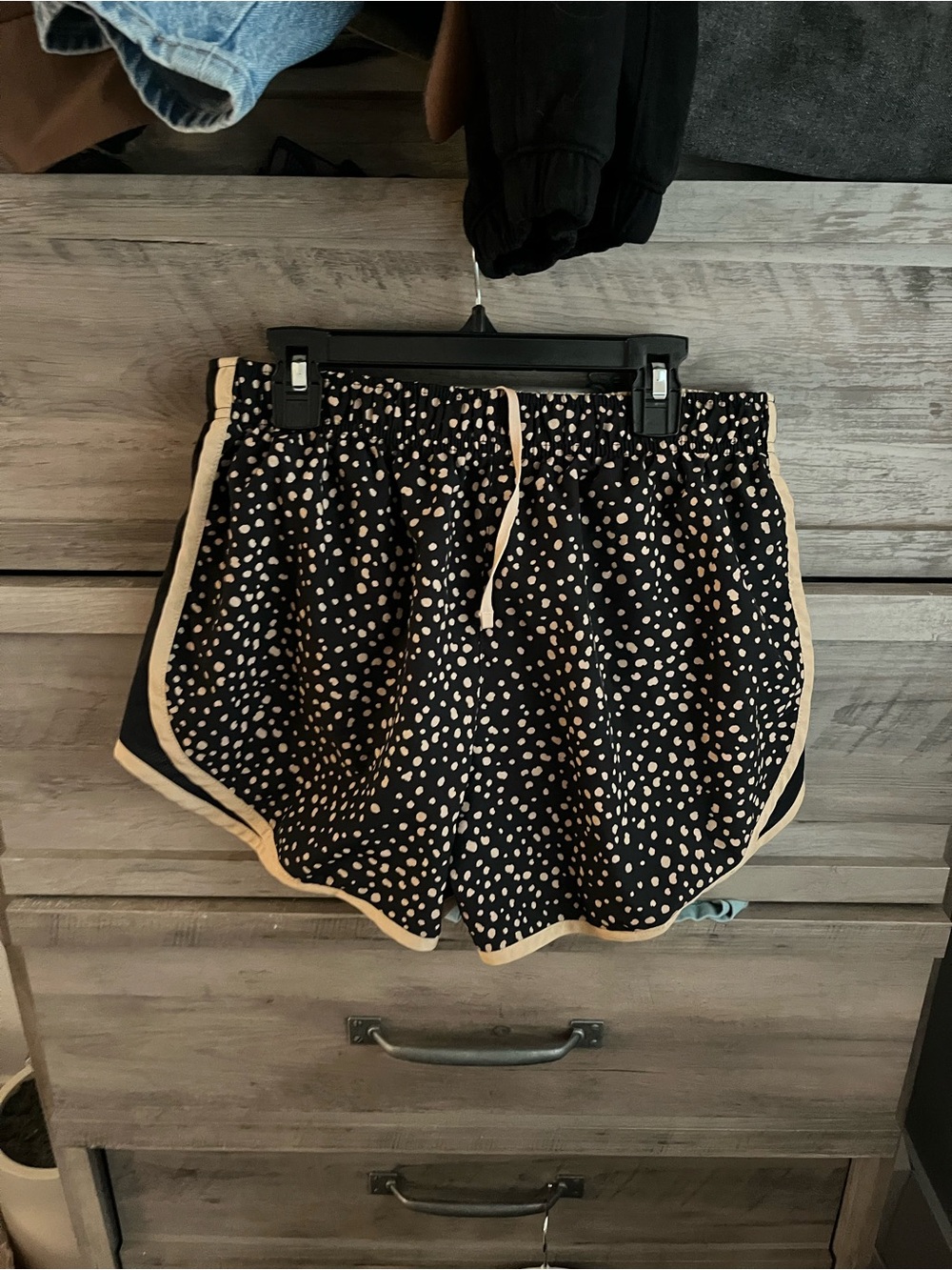 Nike Black Athletic Shorts with Gold Dot Print